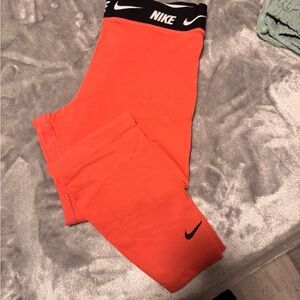 Nike Women's Vibrant Peach Leggings